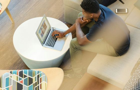 Professional using AI-driven HR technology to enhance decision-making with workforce analytics and employee engagement insights