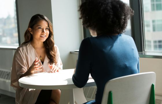 One-on-one meeting highlighting real-time employee feedback and engagement.