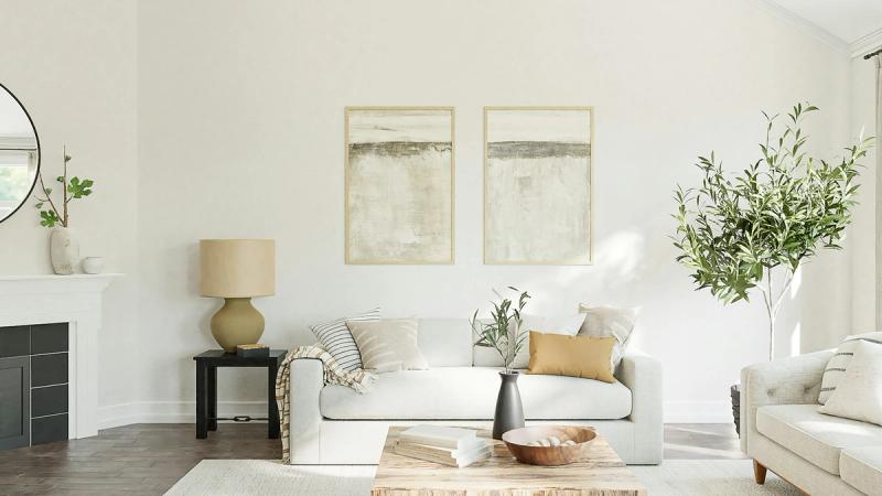 Bright neutral living room with cream sofas, natural textures and soft daylight