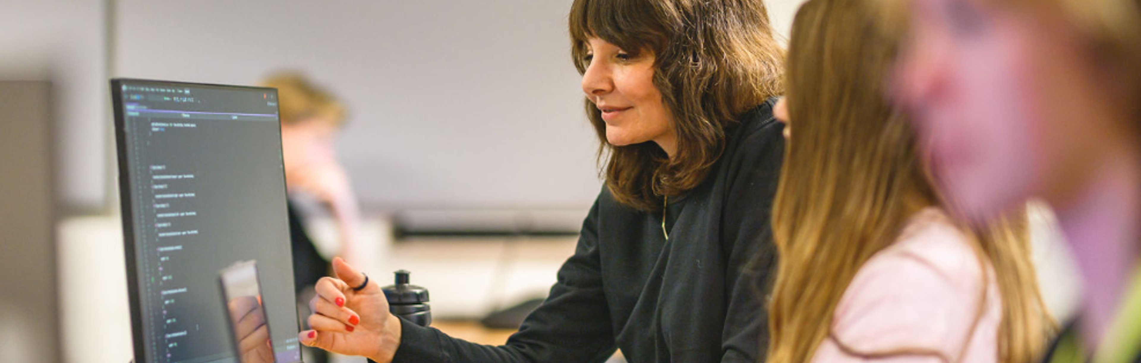 lärare och elev vi dator