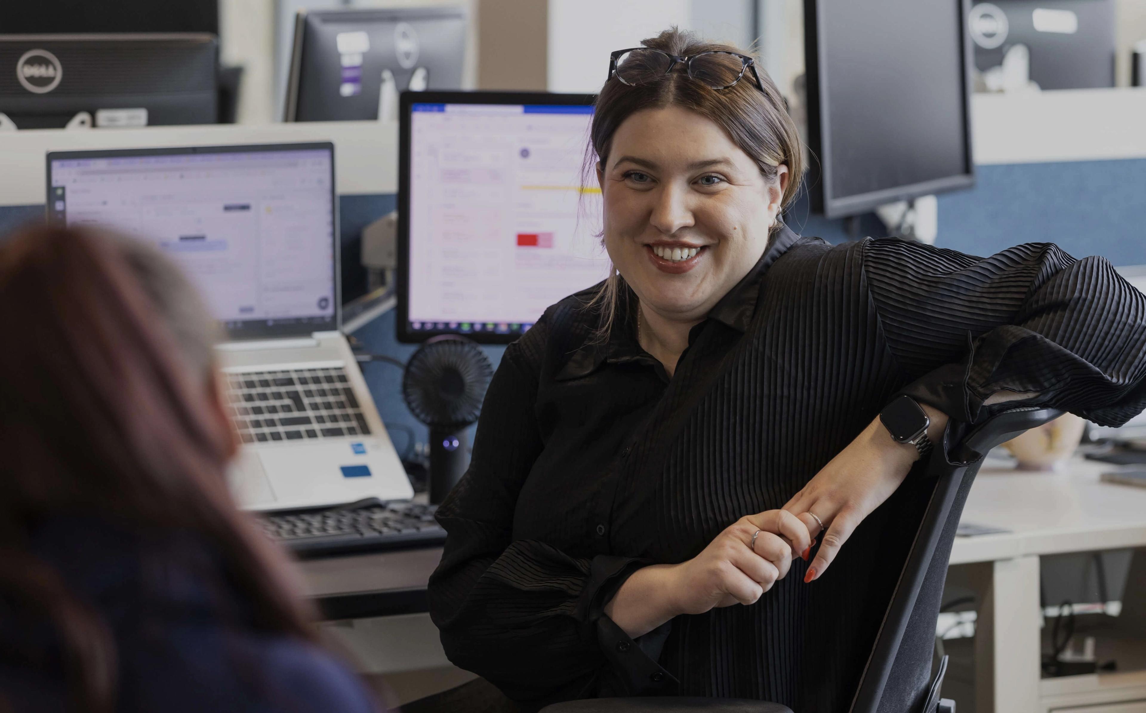woman smiling in the office