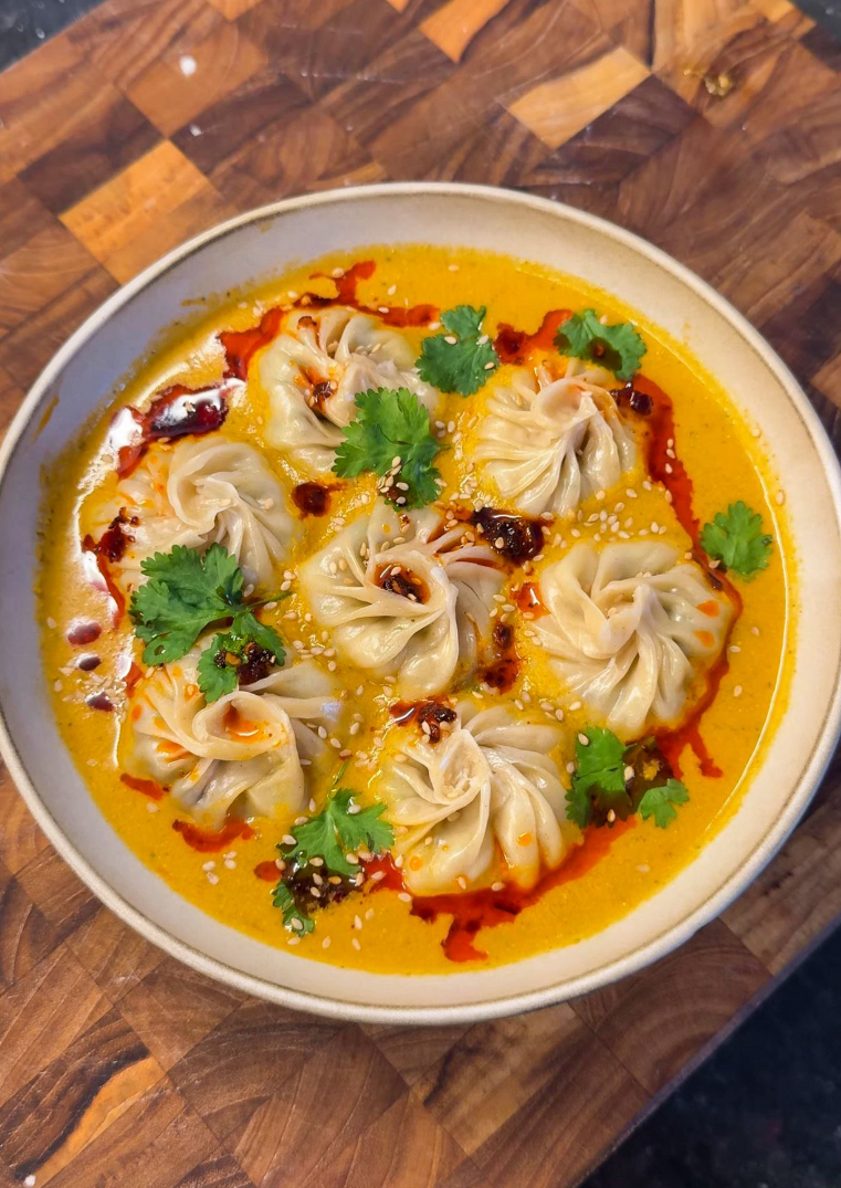 Jhol Chicken Momo (Nepalese Steamed Dumpling in a Spiced Sesame Tomato Broth)