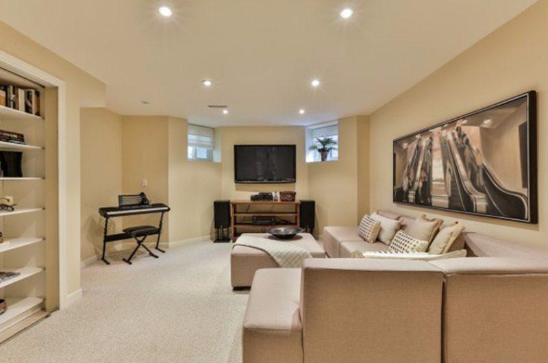 A room staged with original oil paintings