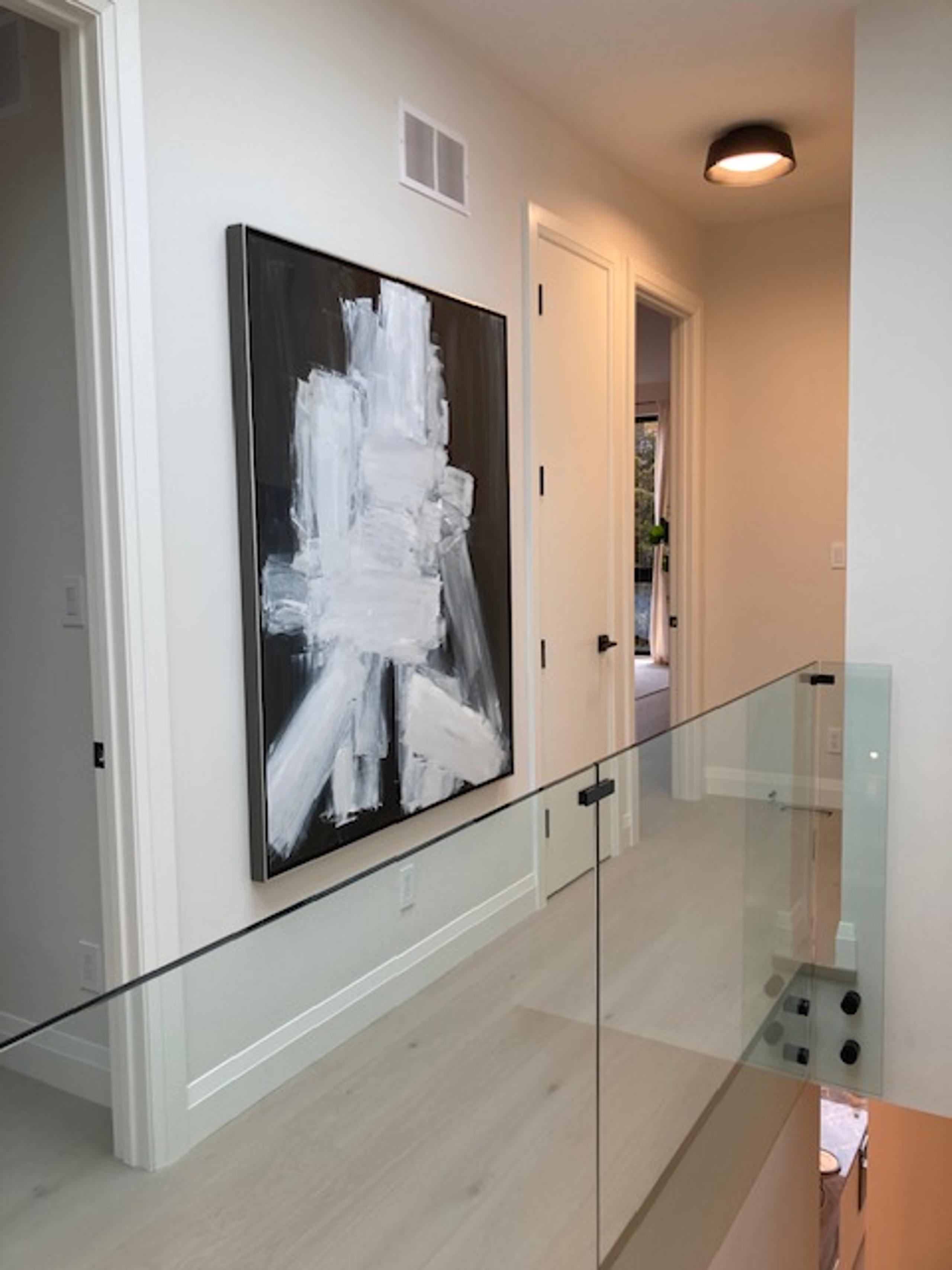 Original art staged in a Hallway