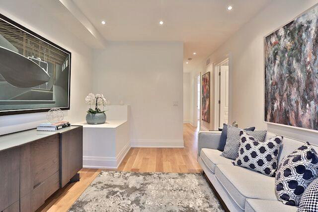 Original art staged in a Family Room