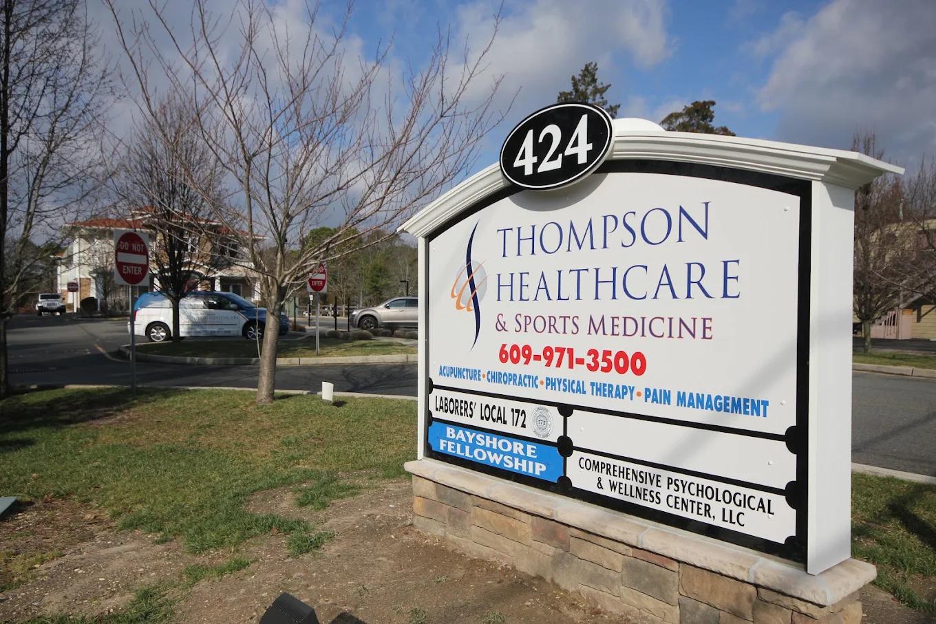 Sign on Main Street in front of the Lacey location of Thompson Healthcare & Sports Medicine.