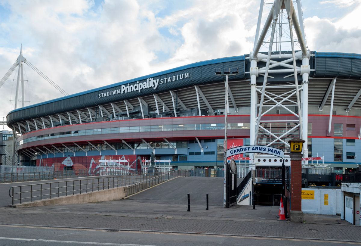 Exterior of Principality Stadium in Cardiff seen from Westgate Street, with the Cardiff Arms Park entrances in the foreground