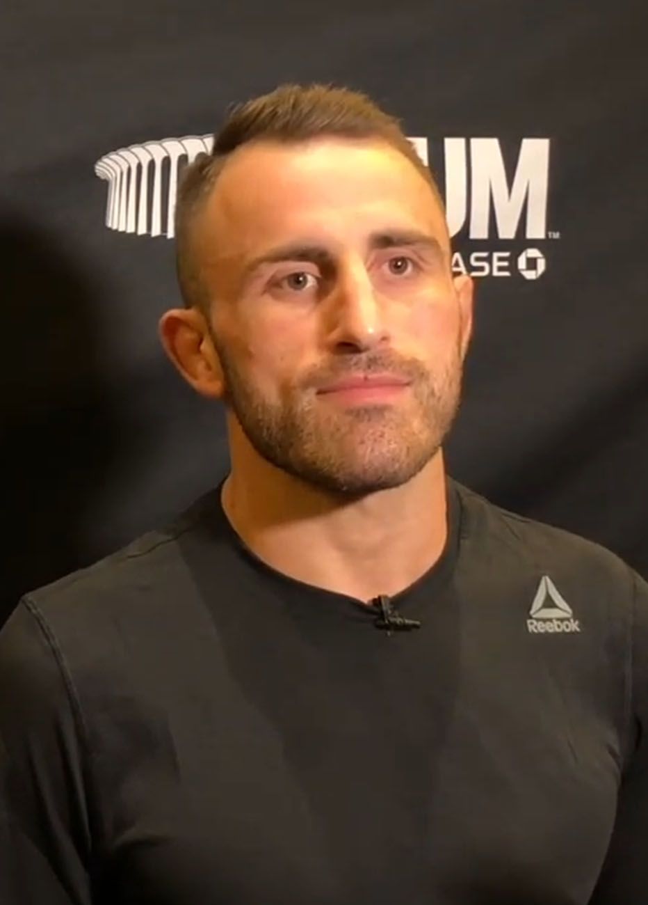 Alexander Volkanovski speaking to the media at UFC 232 in December 2018