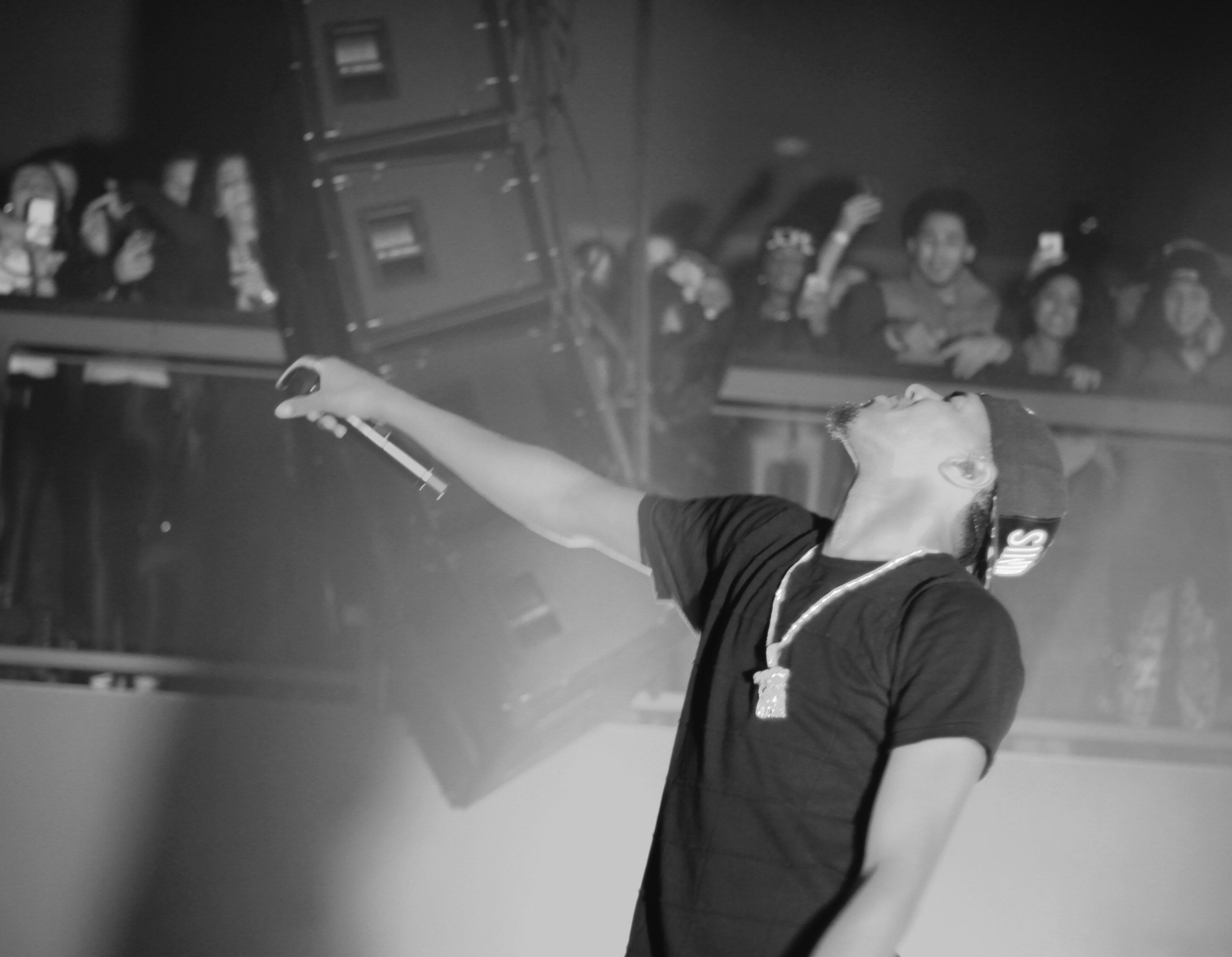 J. Cole performing on the What Dreams May Come Tour in January 2014