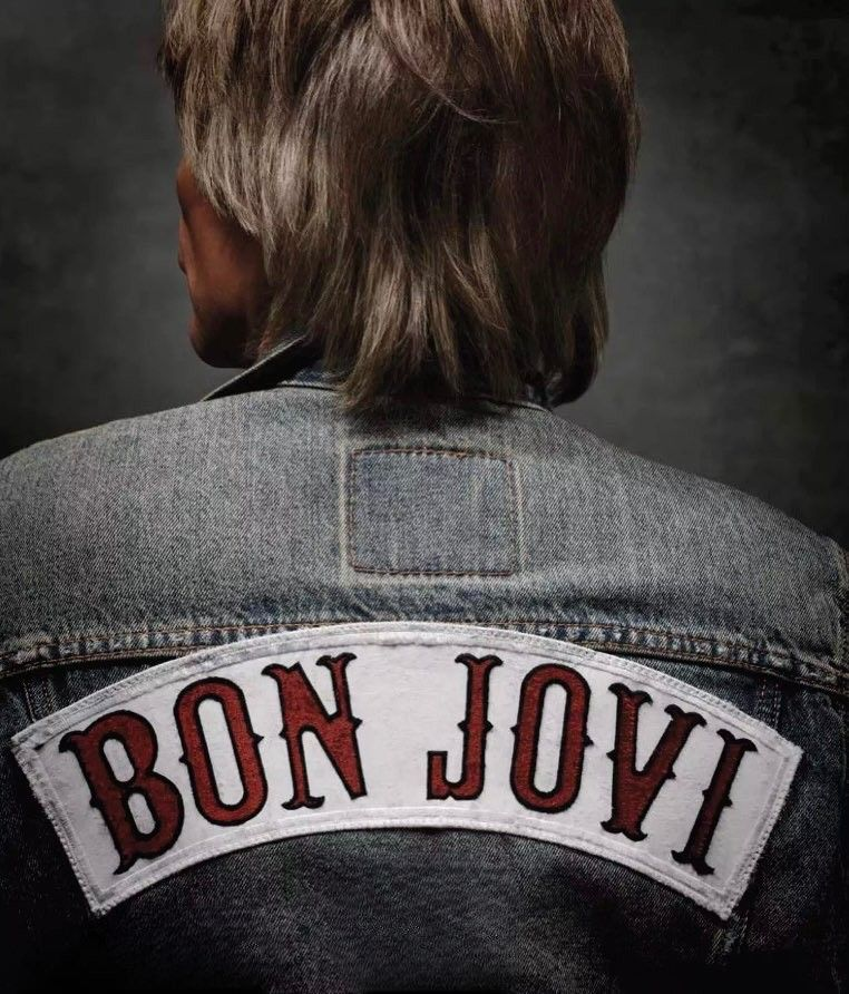 Jon Bon Jovi-style mullet, denim jacket with "BON JOVI" patch, 80s rock aesthetic.