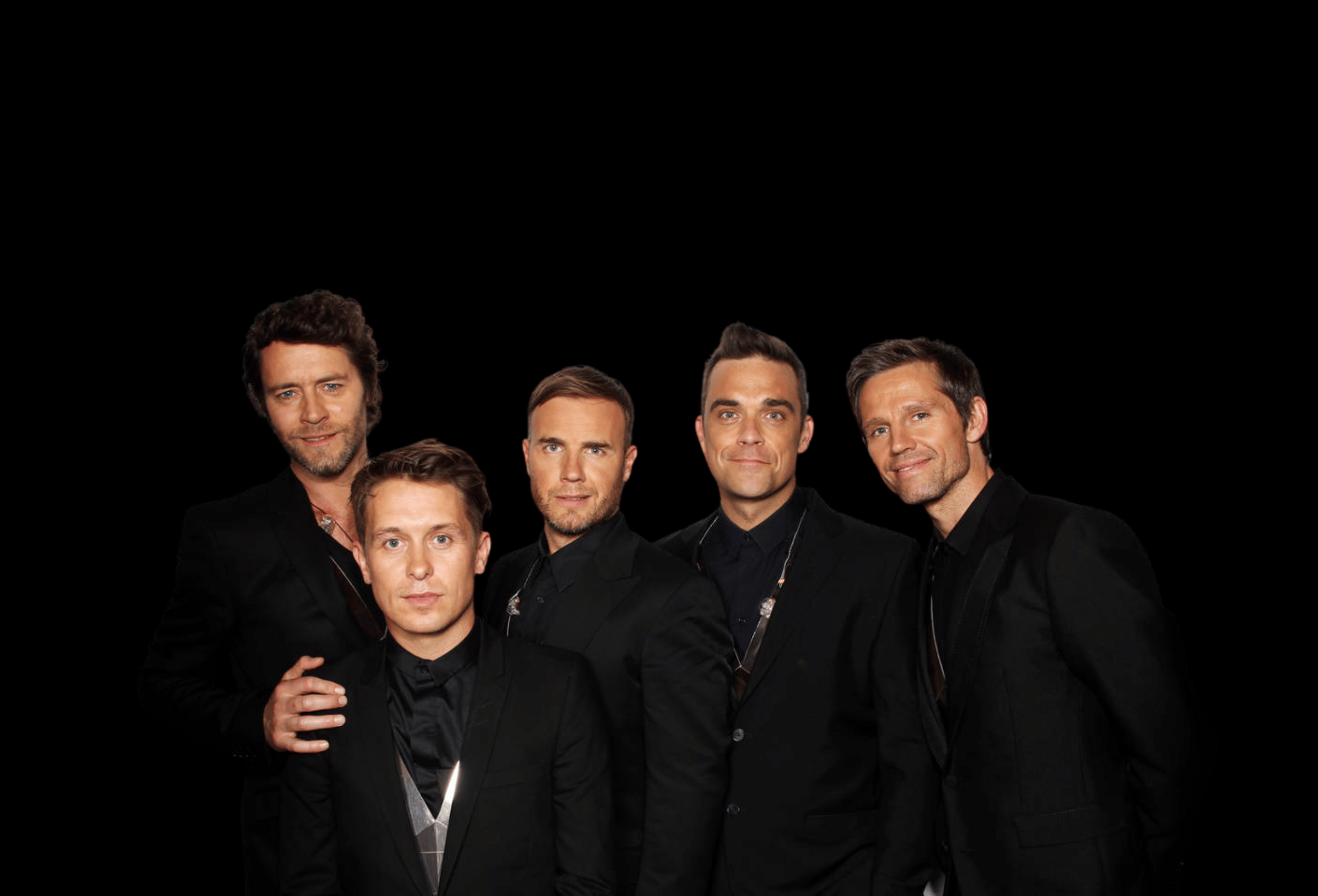 Take That boy band awards-worthy shot: five original members in black suits, studio portrait.