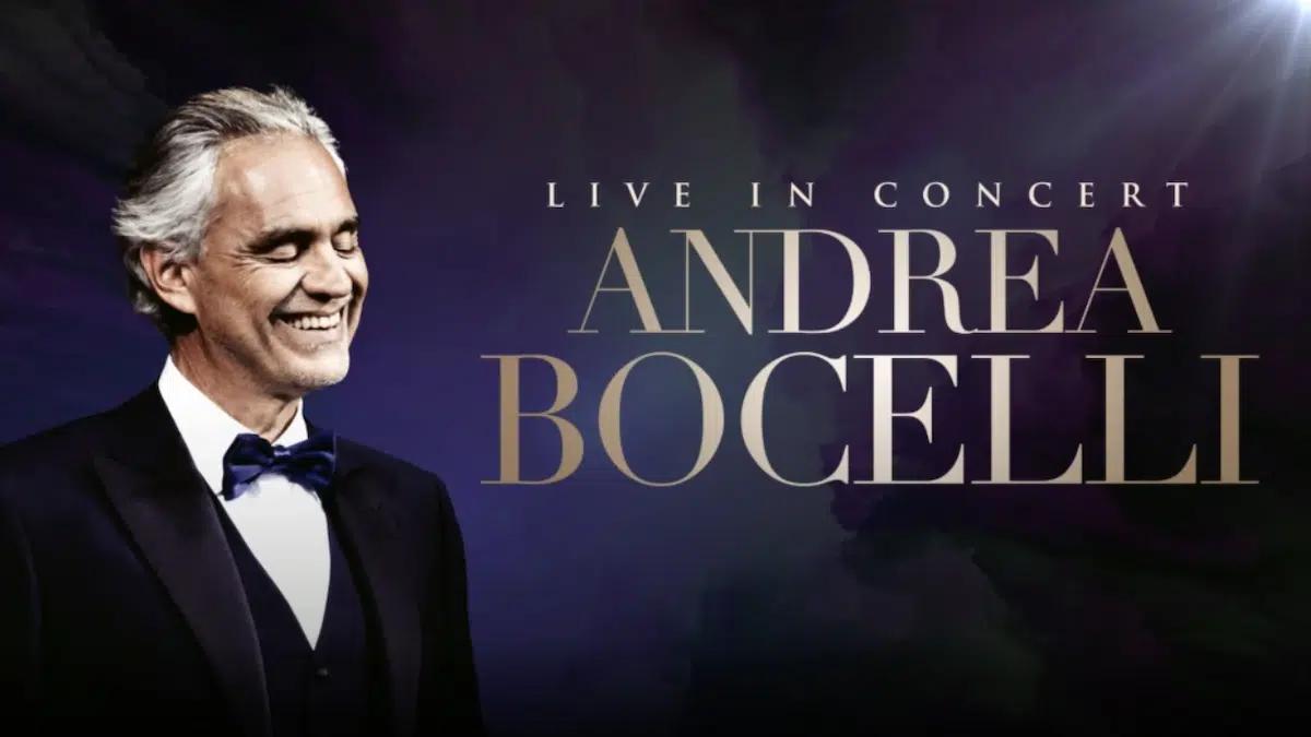 Promotional image for Andrea Bocelli Live in Concert featuring the tenor in a tuxedo, smiling with eyes closed