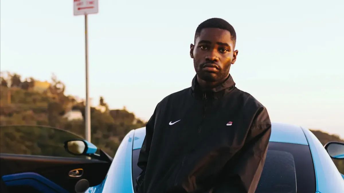 Dave by Luxury Car Urban Hillside Promotional Shot