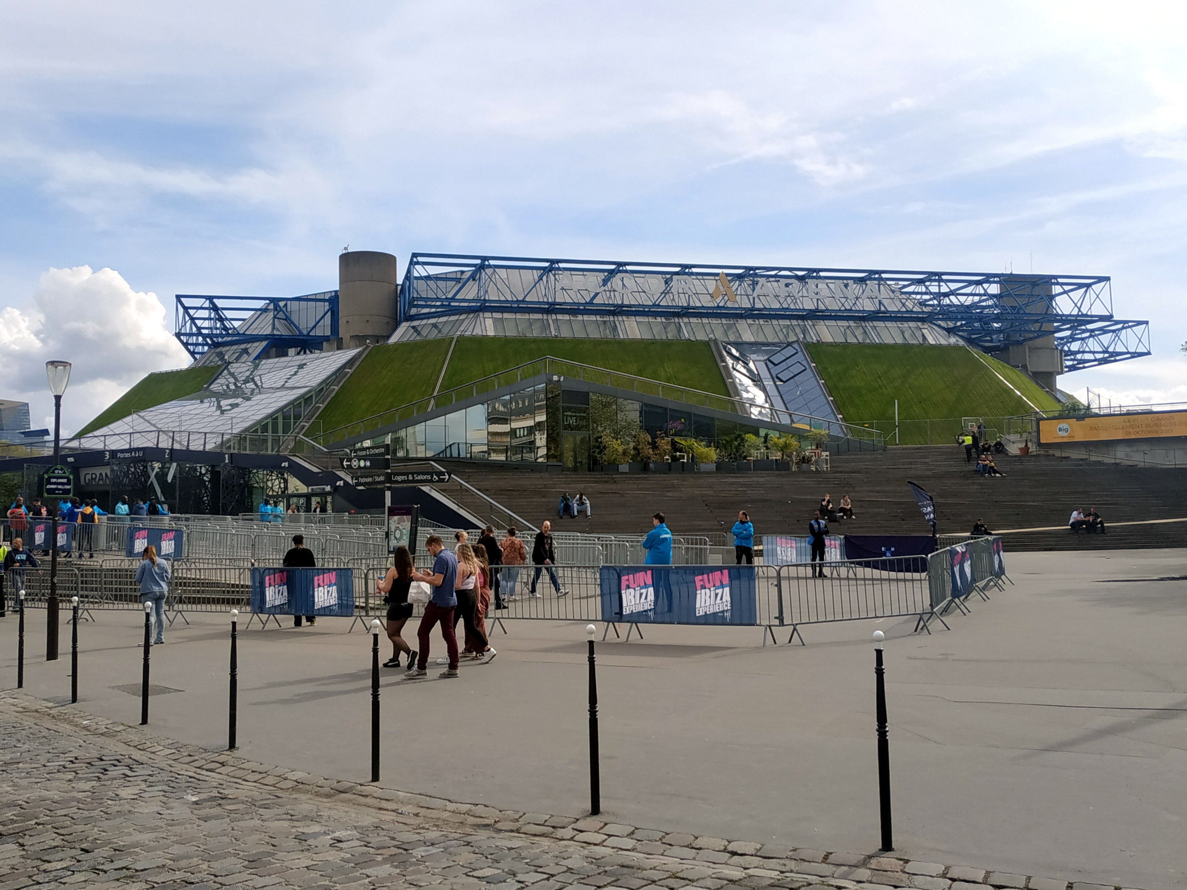 Accor Arena in Bercy, Paris, with its grass-covered sloping walls and blue roof frame, in April 2023
