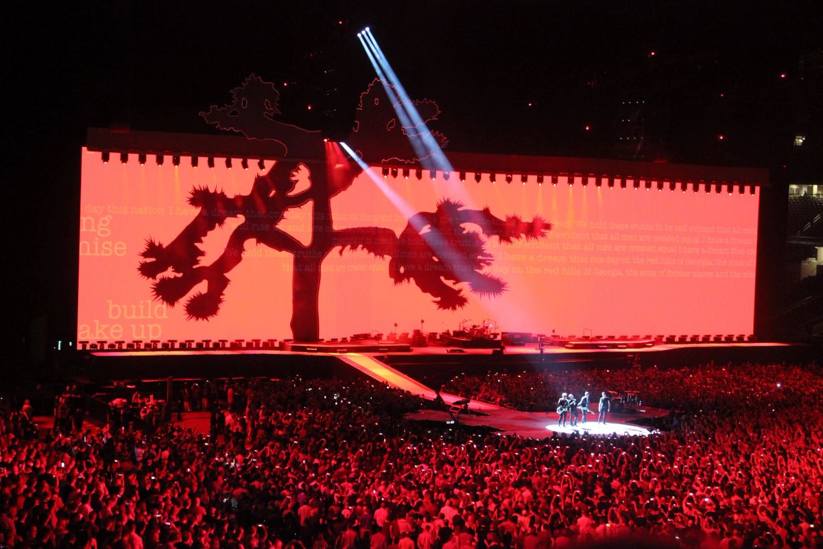 U2 on stage at a stadium concert in Arlington, Texas, during the Joshua Tree Tour in May 2017