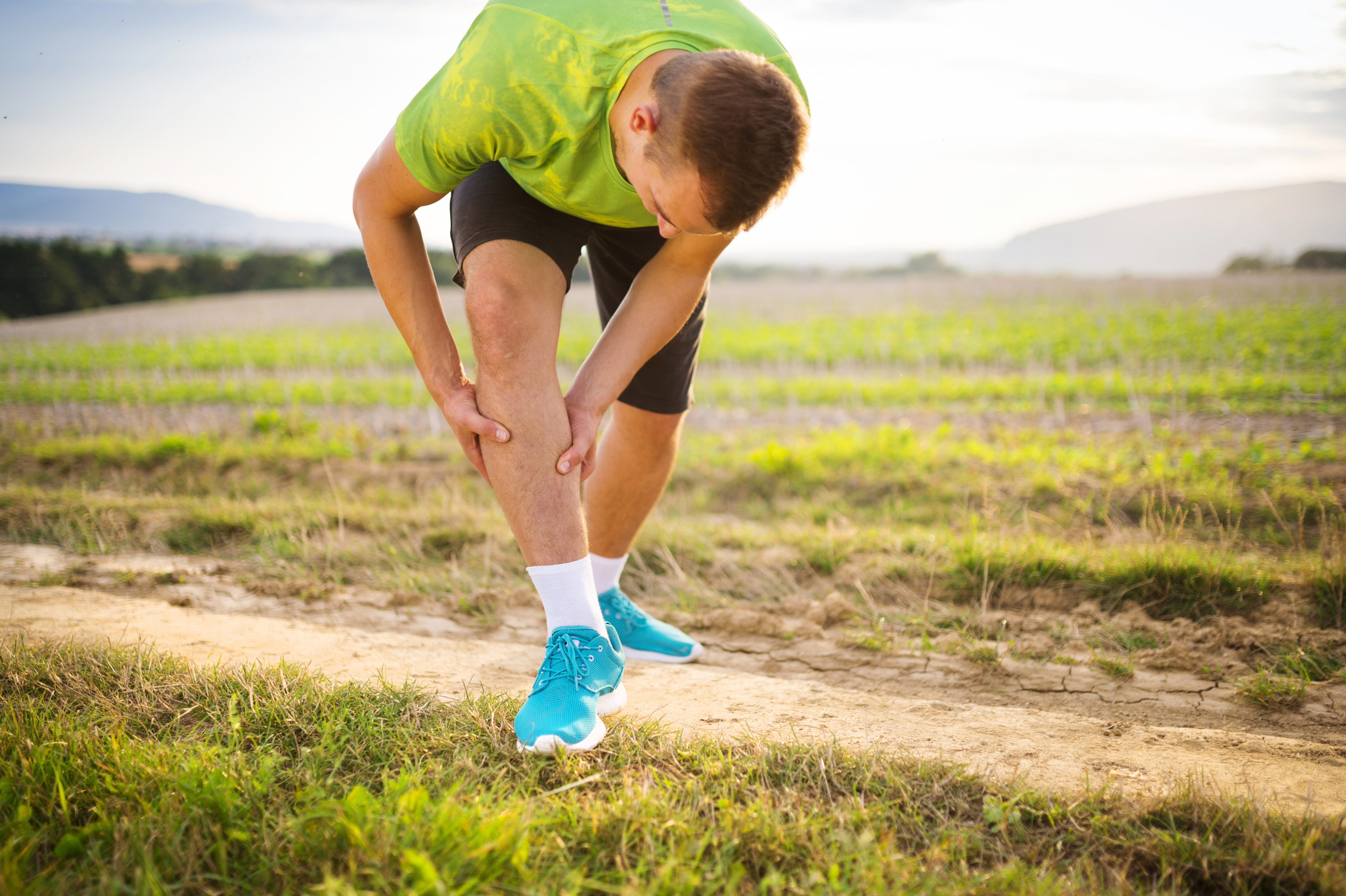 The most common calf strain symptom is feeling a sudden sharp pain in your calf while doing an activity.