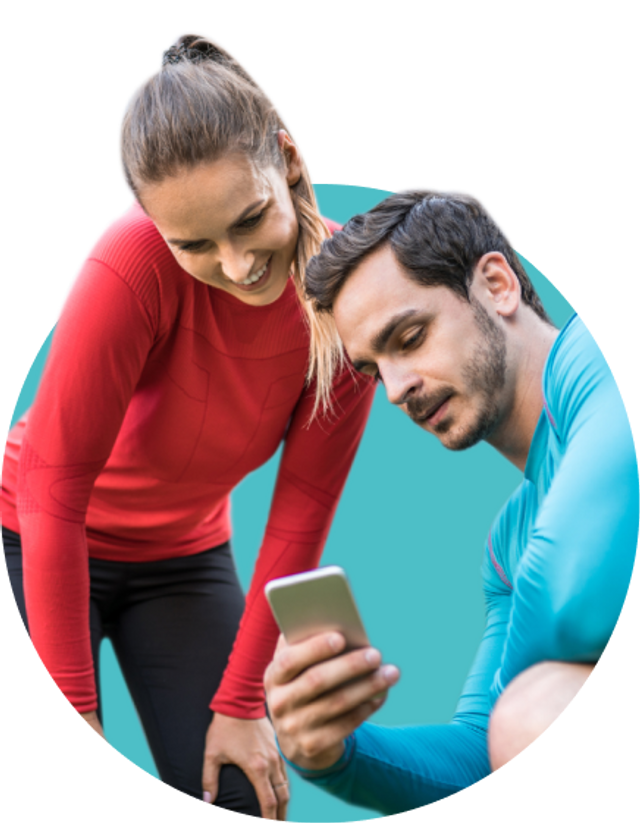Two runners looking at the Exakt Health newsletter on their phone