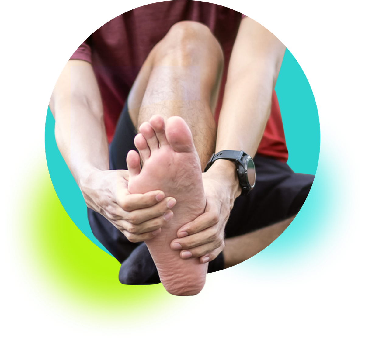 A runner sitting on the floor and holding the bottom of their foot due to plantar fasciitis pain.