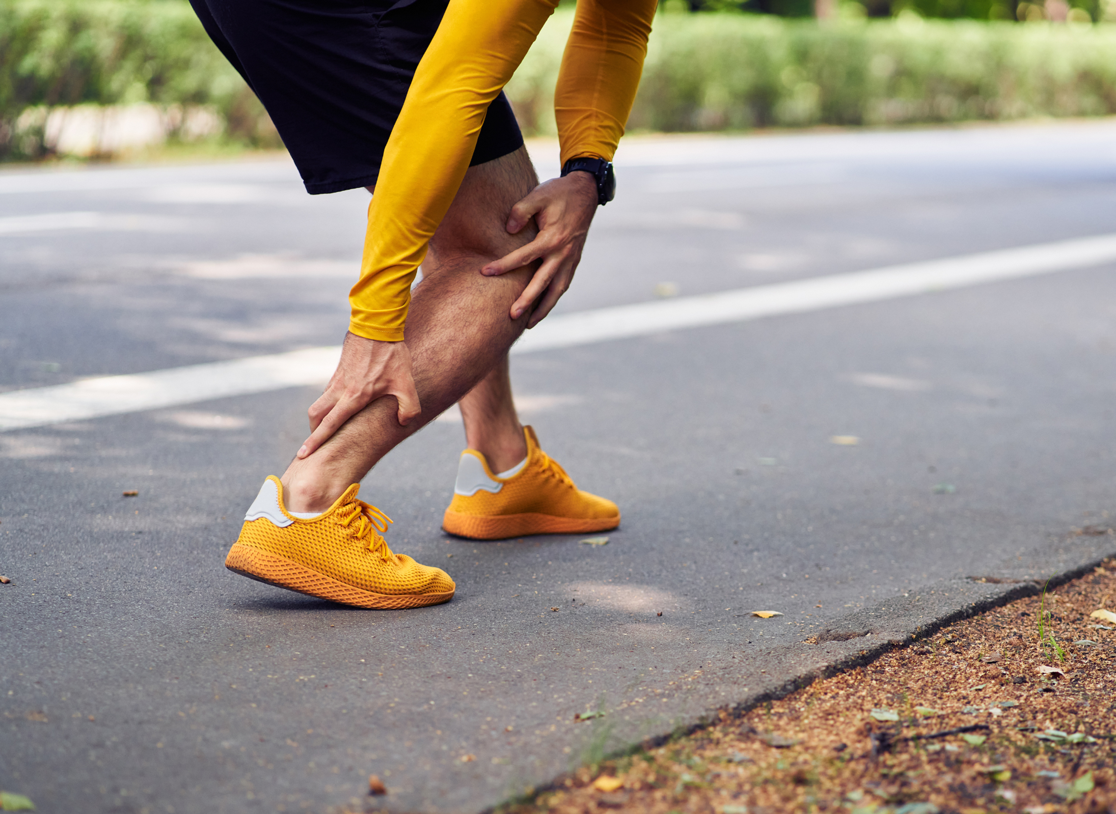 What causes Achilles pain when running and can you continue?
