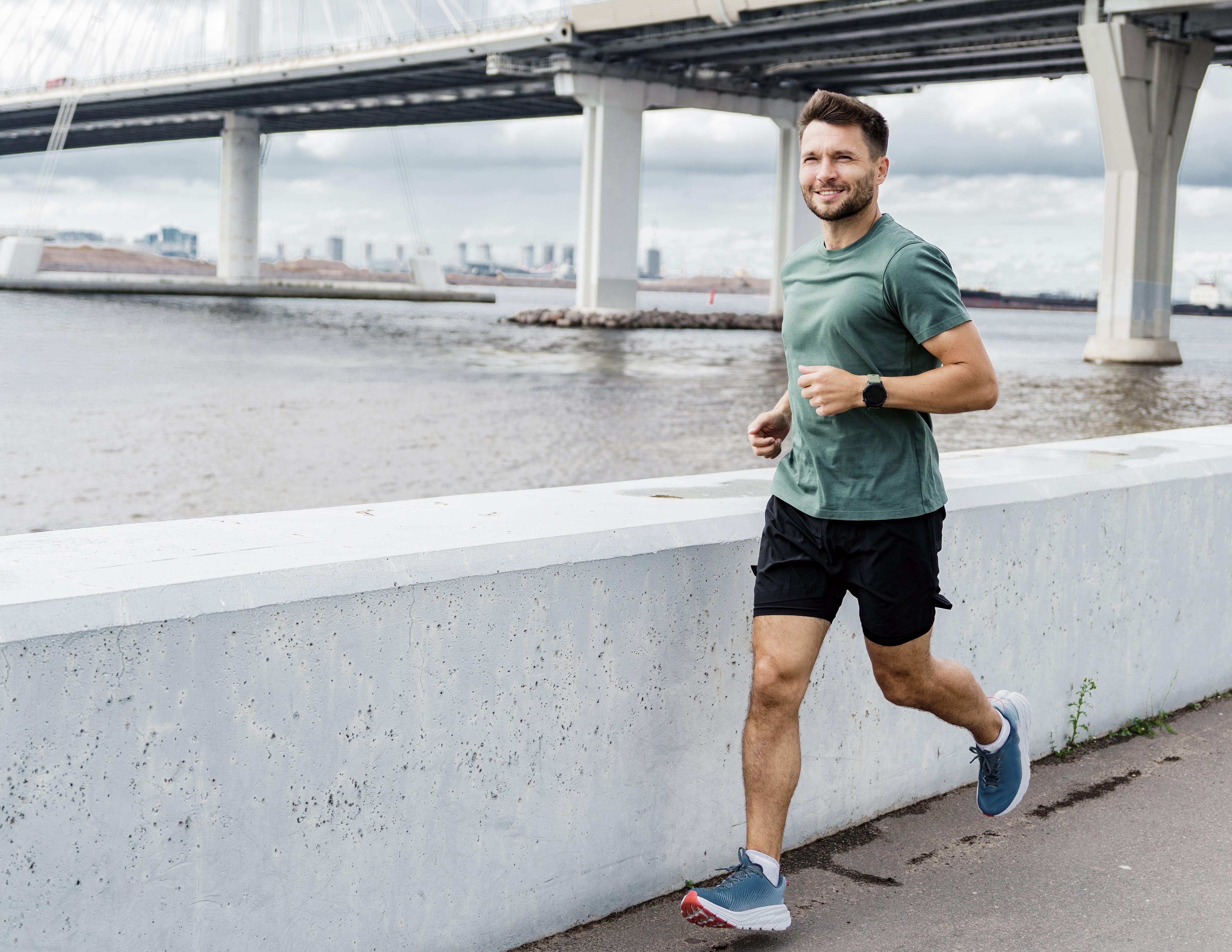 Male beginner runner enjoying his run.