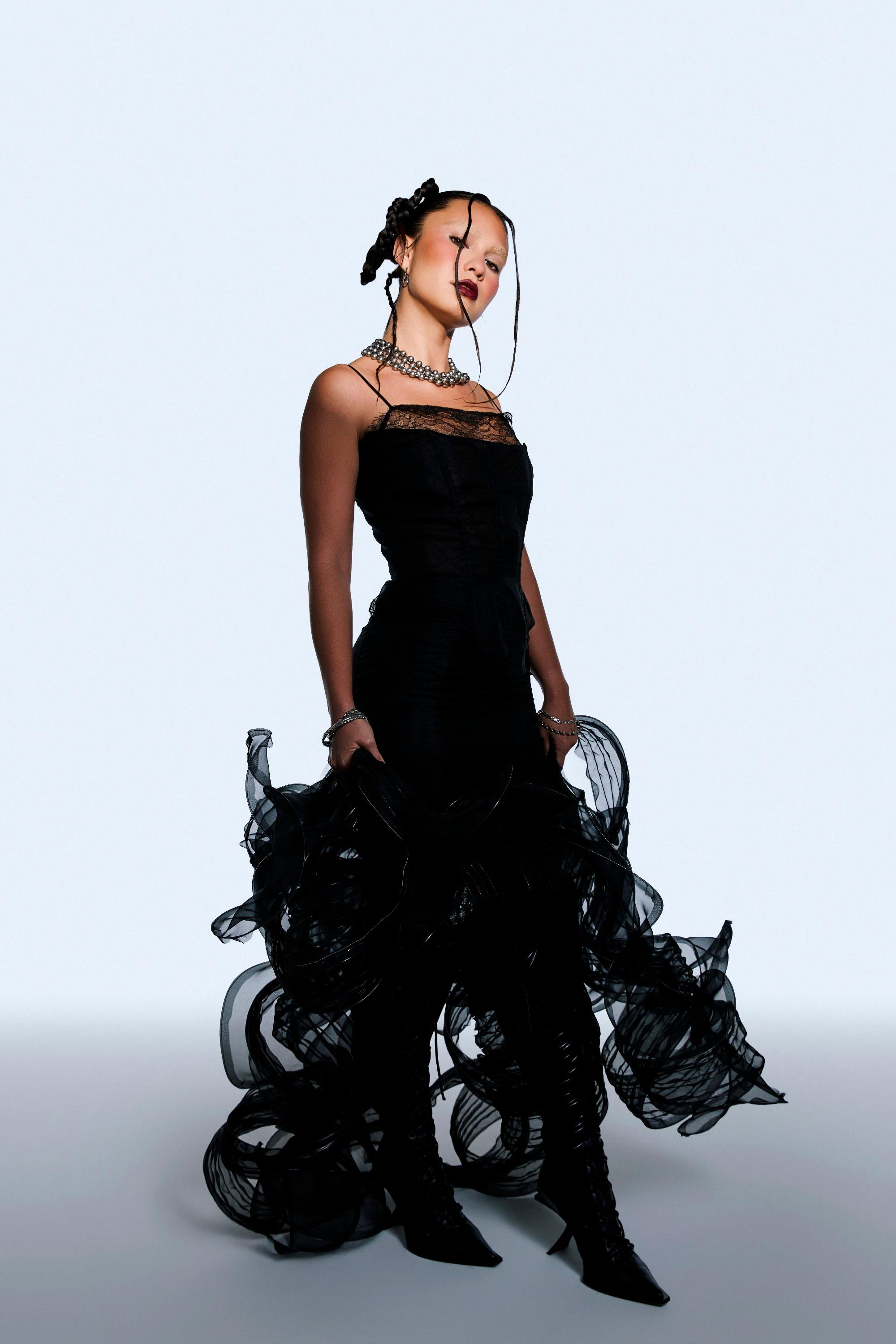Black sculptural evening dress from Luxi Deng’s Shadows of Ink collection.