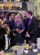 Ken Sharpe and Elon Musk Shaking Hands