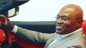 Douglas Munatsi in a Ferari