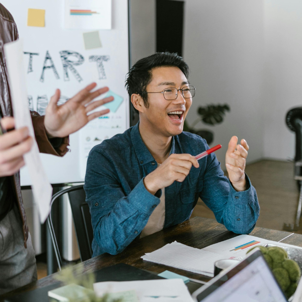 Man smiling in an office