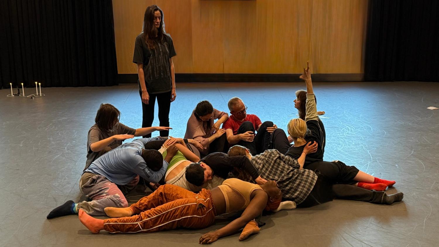 a group of people on the floor, together