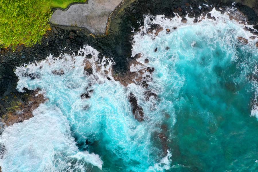 Teal waves crashing into the Big Island of Hawaii