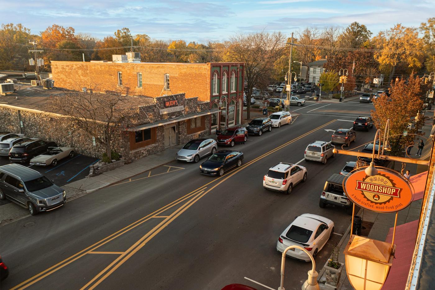 Rudy's market at sunset with woodshop