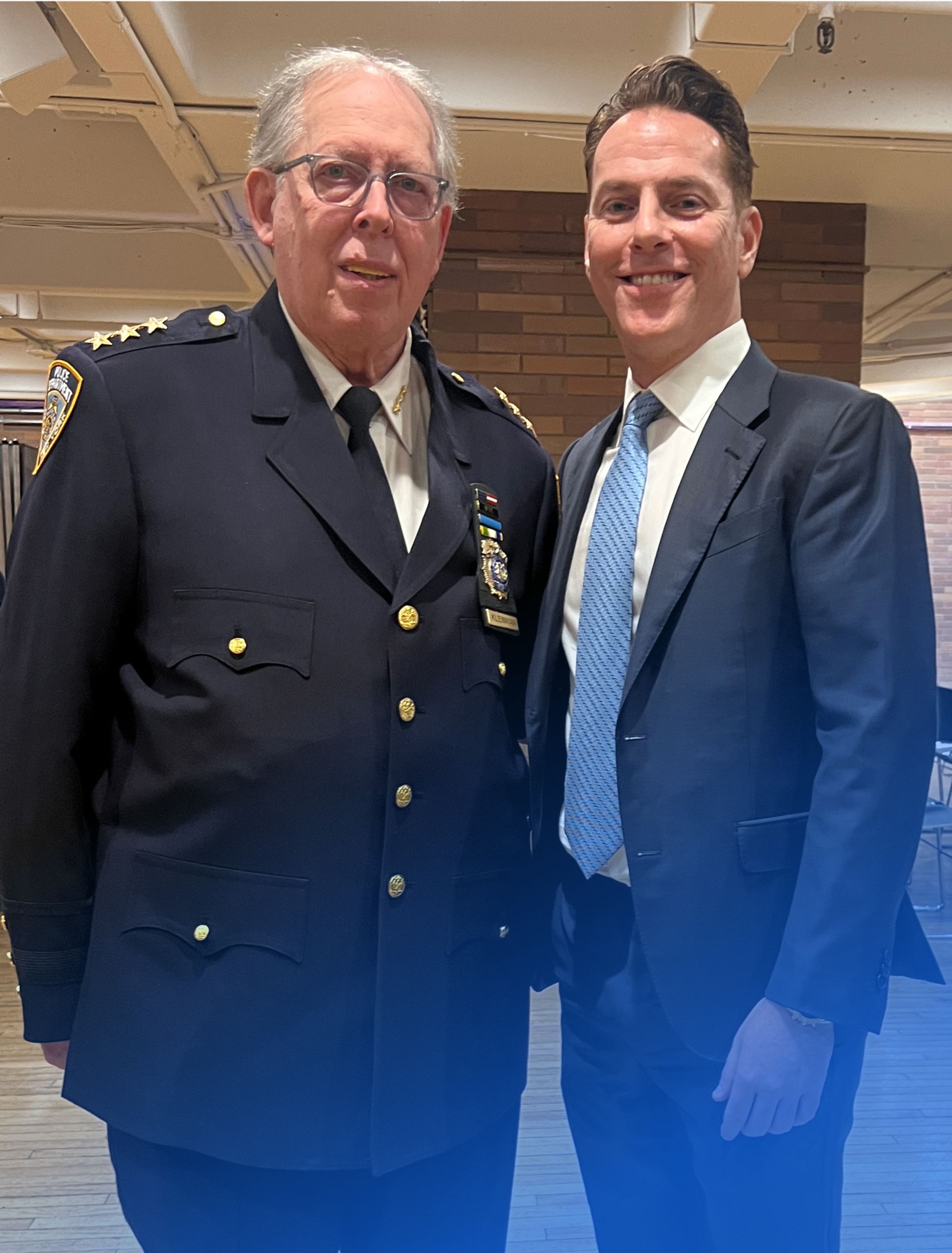 Dr. Neal Blitz posing with Dr. Eli J. Kleinman at the ceremony