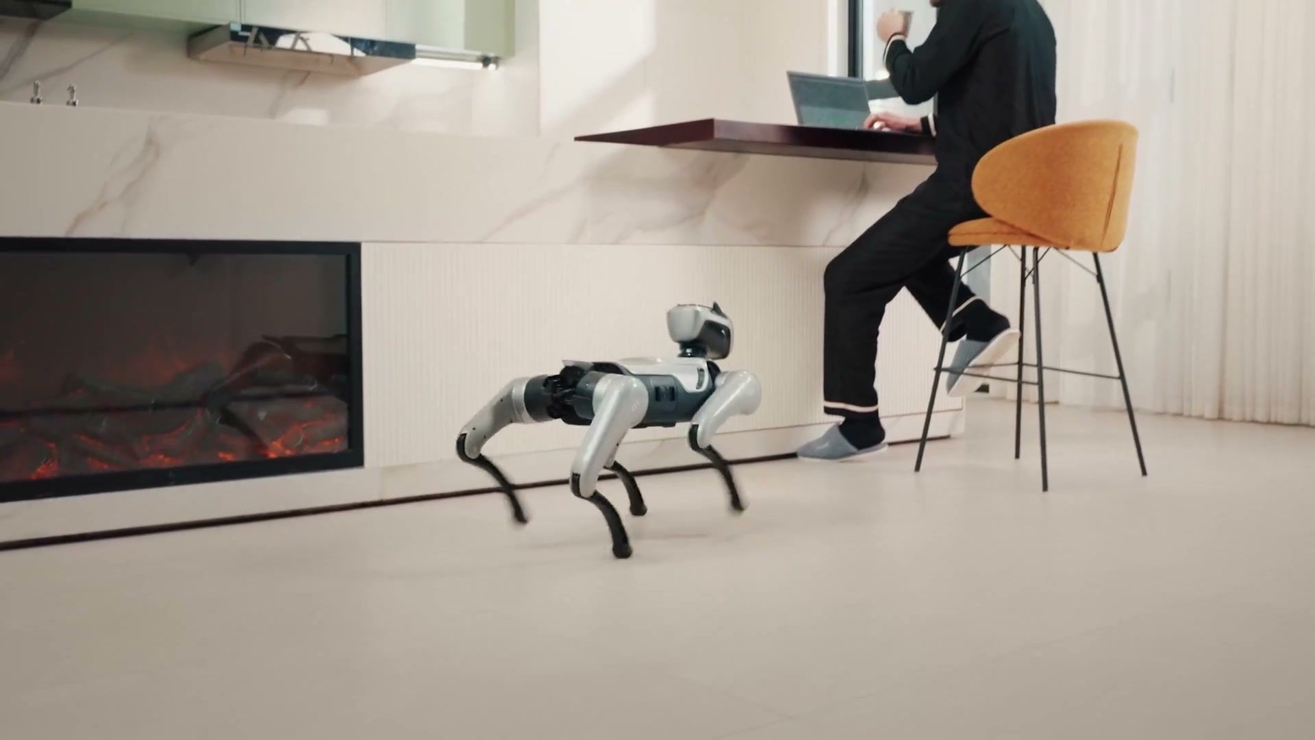 MagicDog quadruped robot walking through a modern living space