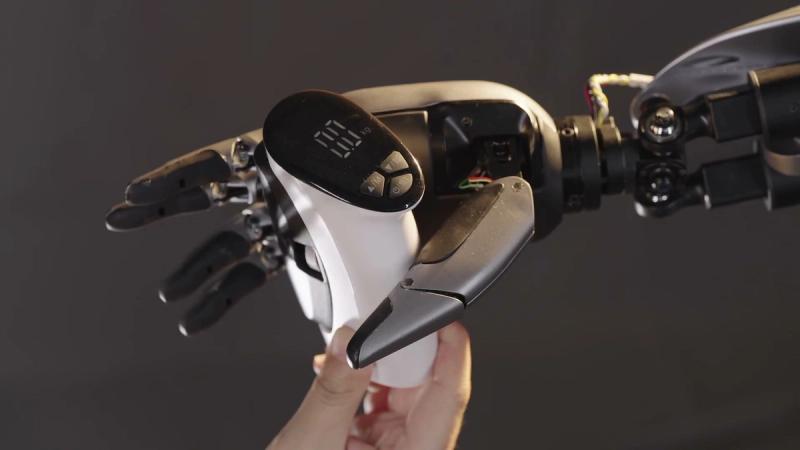 MagicHand S01 dexterous robotic hand grasping a hand-held tool