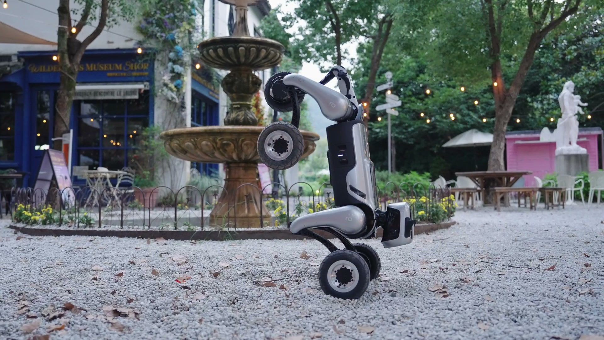 MagicDog-W wheeled quadruped robot navigating a public plaza