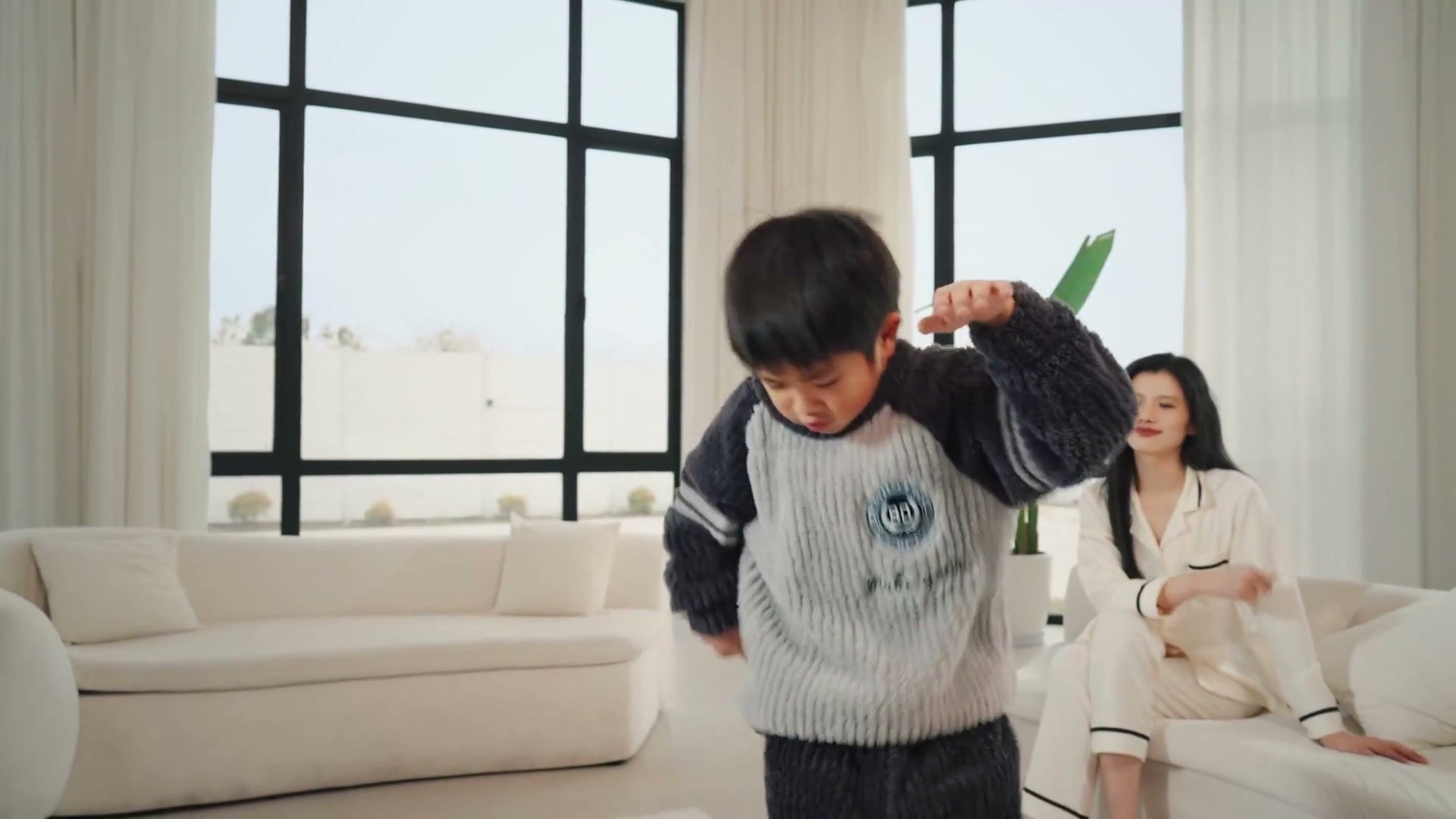 MagicDog quadruped robot beside a child in a living room