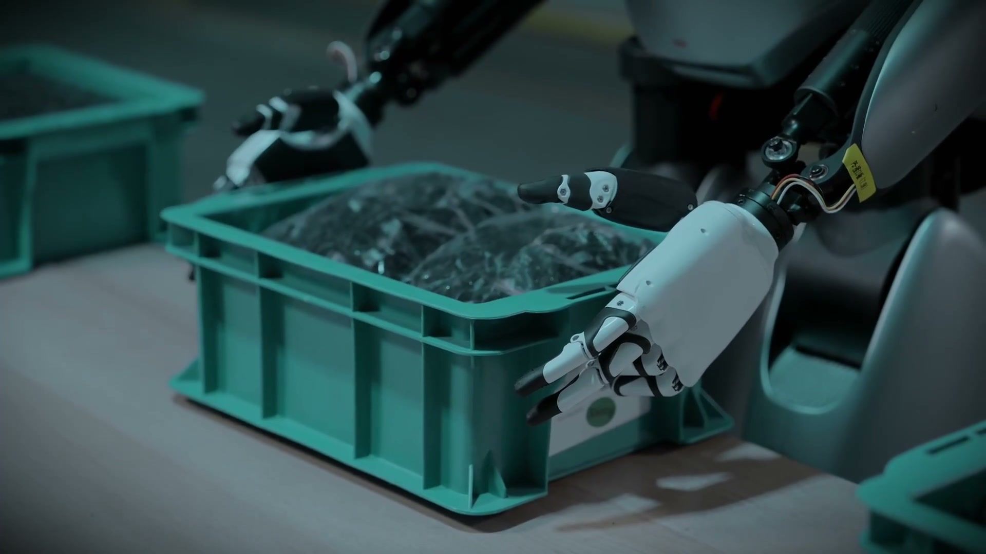 MagicBot humanoid robot picking parts from a logistics bin