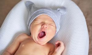 Understanding Baby’s Cues: What That Yawn or Fist Clench Means