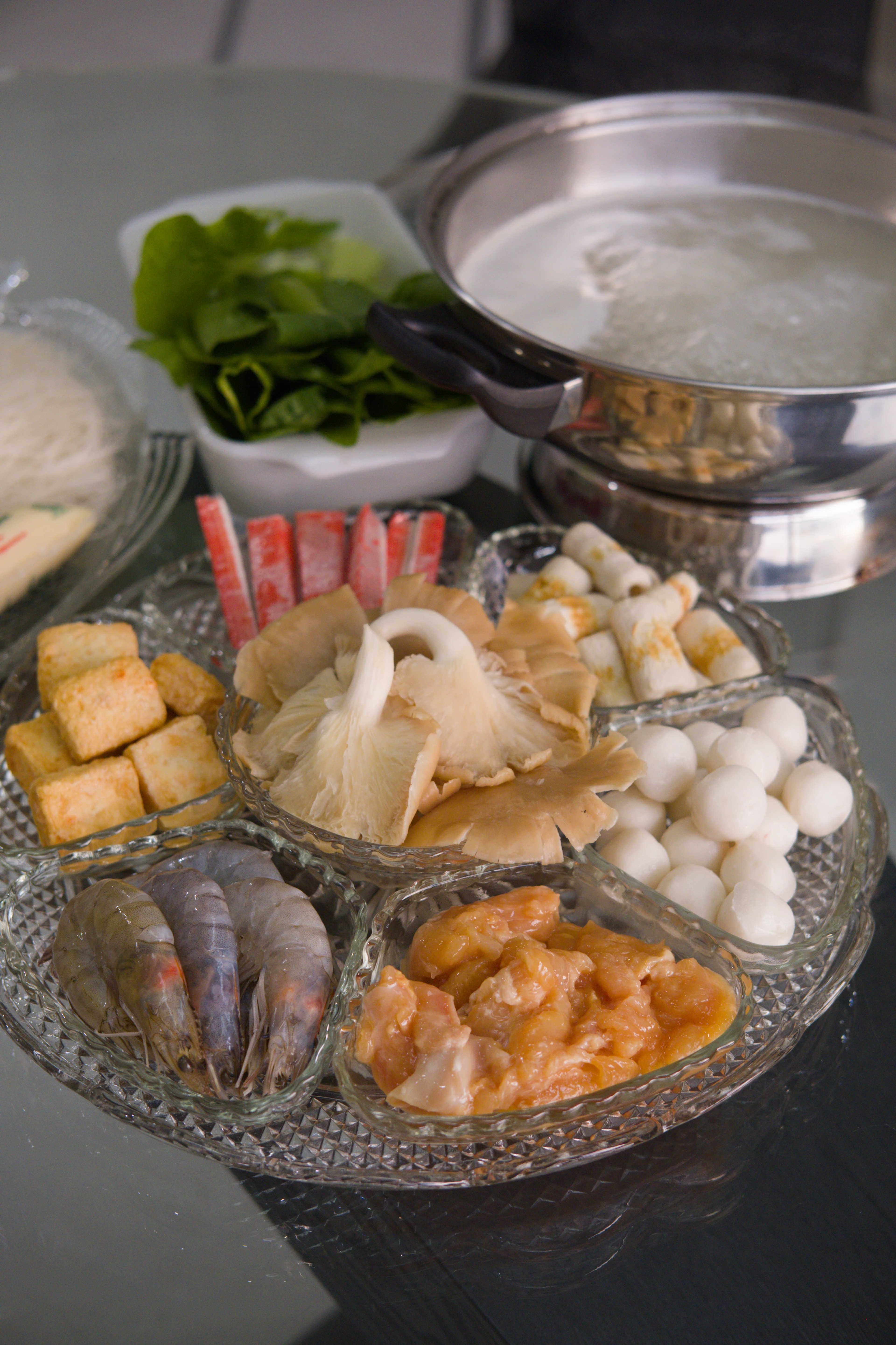 Steamboat hot pot spread with prawns and fish balls