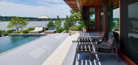 New Construction Waterfront Rear Facade Pool