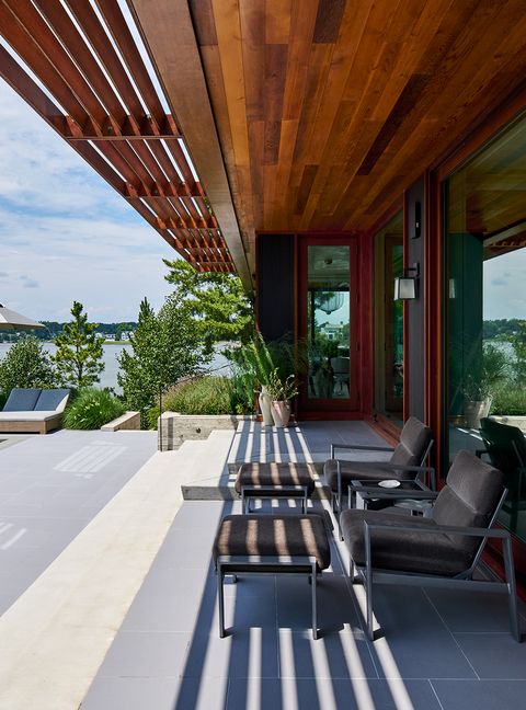 New Construction Waterfront Rear Facade Pool