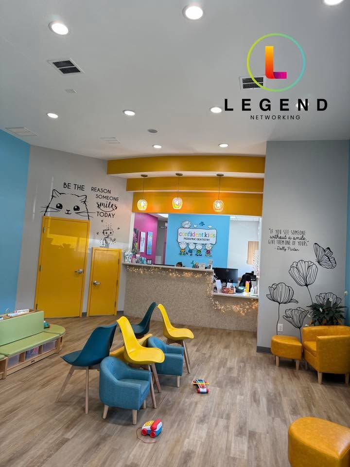 Colorful waiting area with seating facing the front desk at Confident Kids Pediatric Dentistry, Oak Ridge, NC