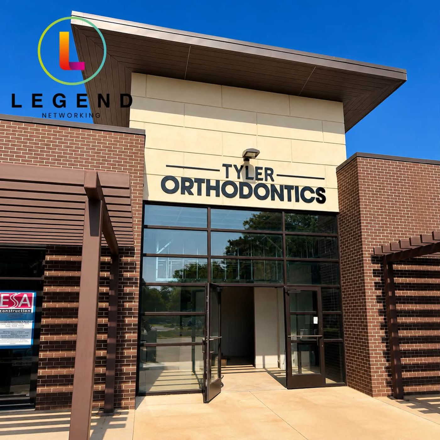 Storefront with the Tyler Orthodontics sign above the glass entrance in Tyler, TX