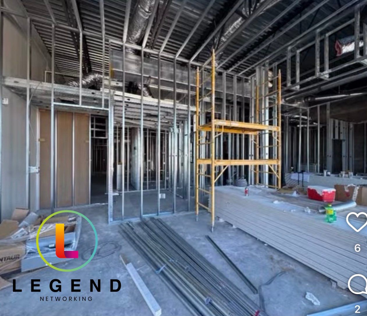 Metal stud framing, ductwork and scaffolding during construction at Thriving Smiles Dental in Spring