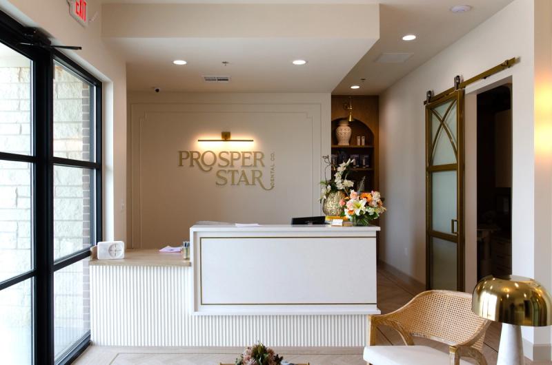 Reception desk and waiting area at Prosper Star Dental Co. in Prosper