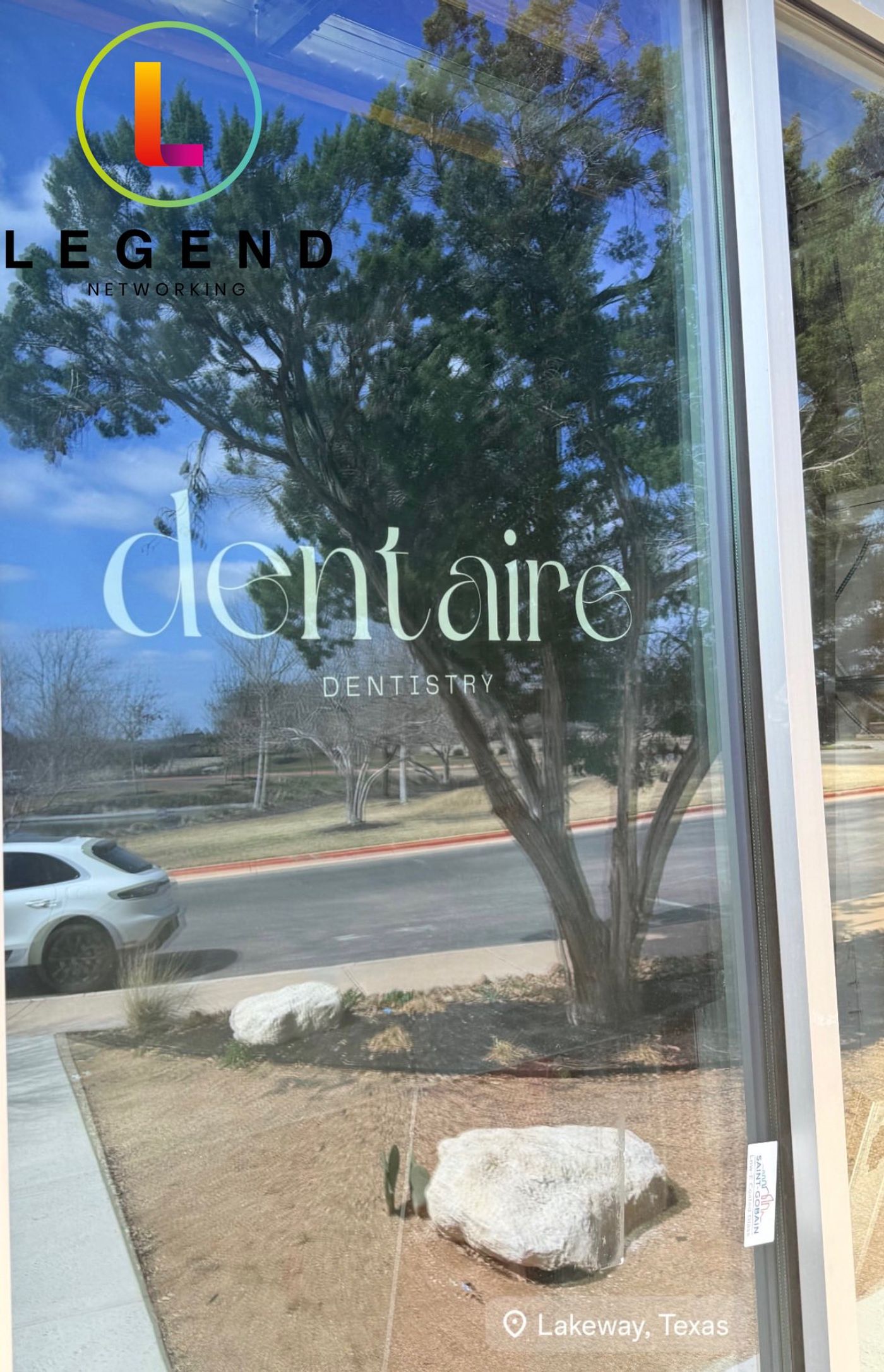 Dentaire Dentistry logo on the front window of the new practice under construction, Lakeway, TX