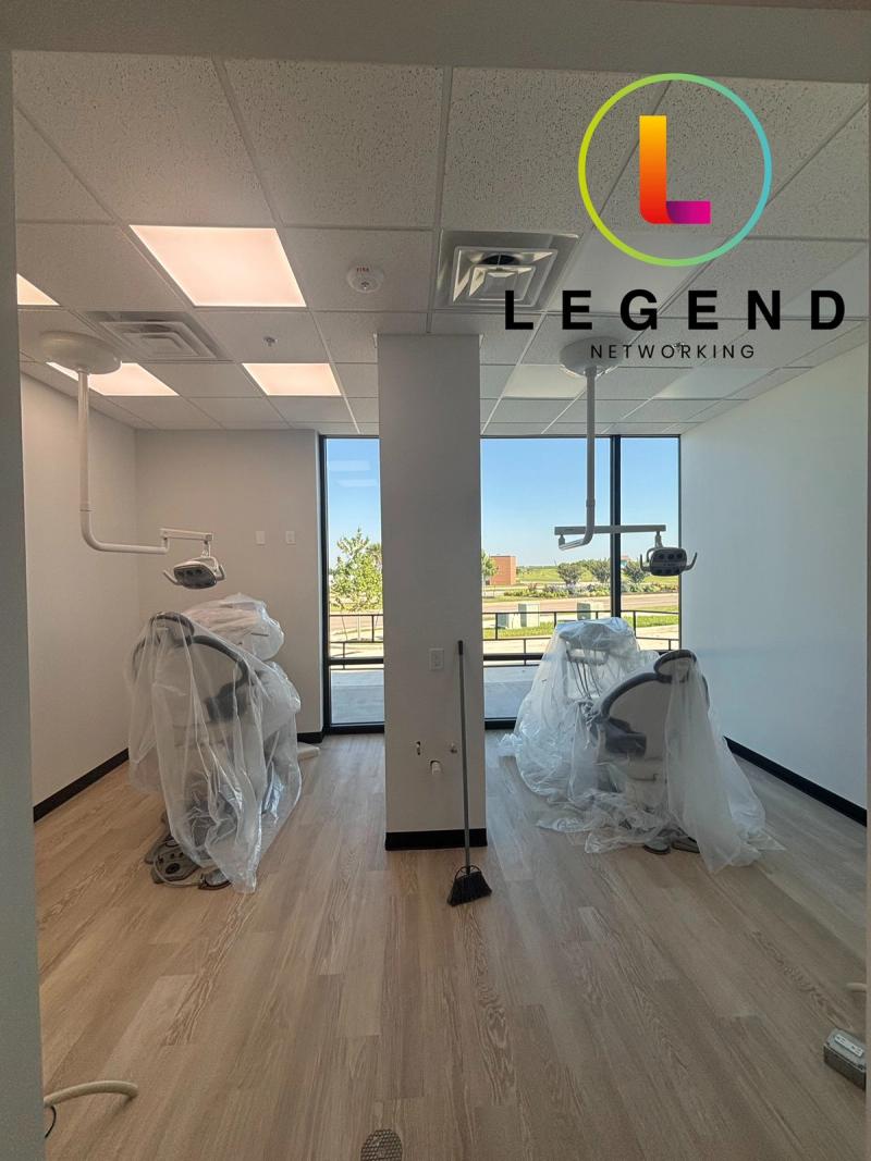 Open treatment area with two wrapped dental chairs by large windows at Floss Dental in Texas City, TX