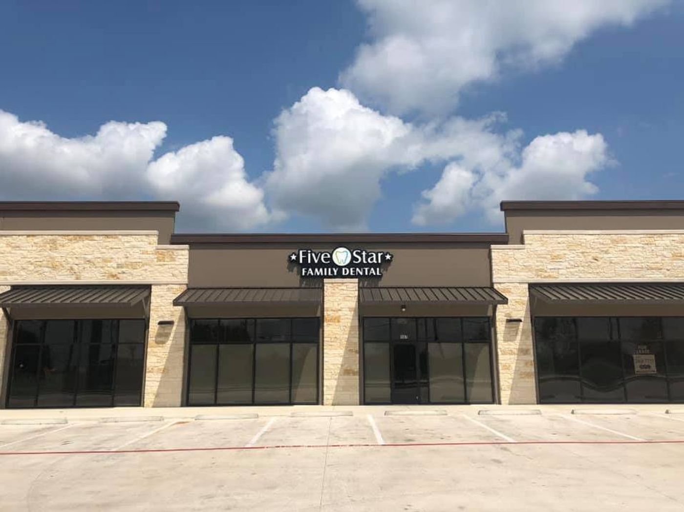 Retail storefront with the Five Star Family Dental sign above the entrance, San Antonio, TX