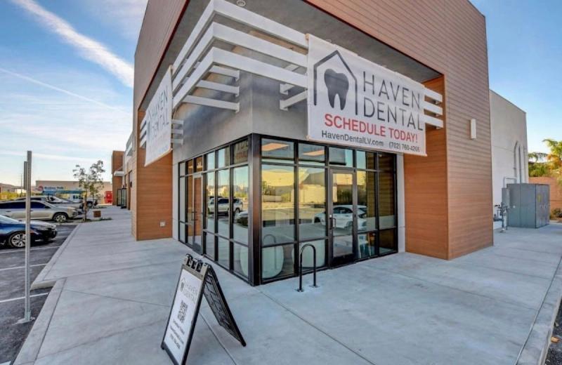 Storefront with a Haven Dental banner and sign at the practice in Las Vegas