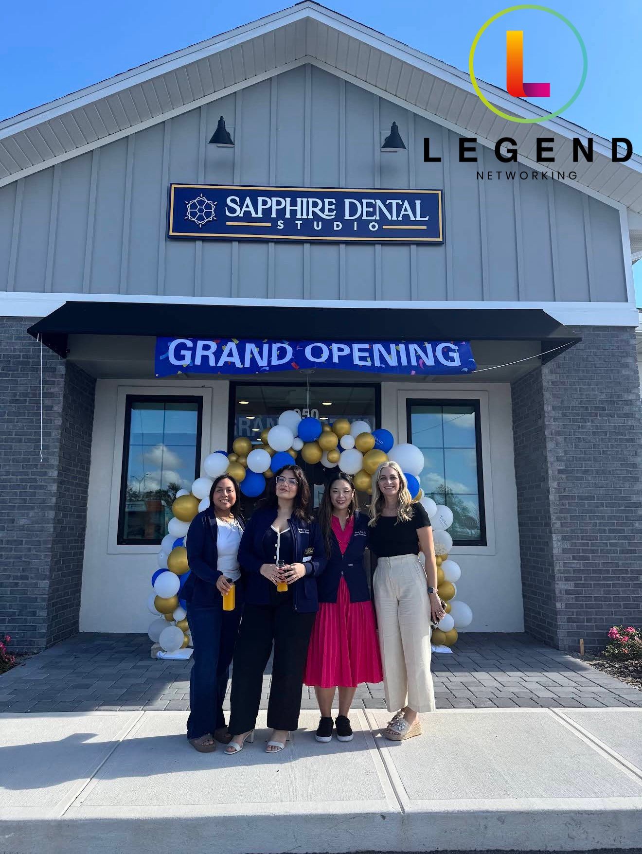 Entrance with a Grand Opening banner and balloon arch at Sapphire Dental Studio in Winter Garden